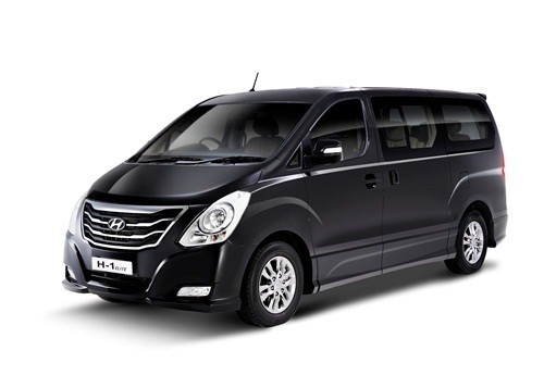 A black Hyundai H-1 van, which can be used as a limousine service.