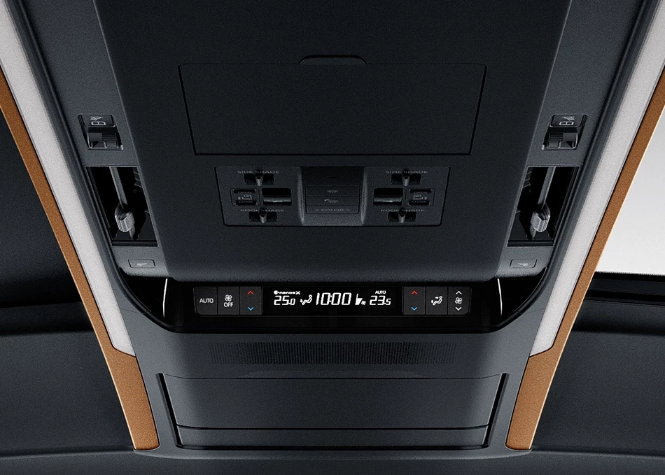 Overhead control panel of a limousine showing temperature settings and other controls such as seat adjustment and light switches.